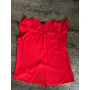 OLM red blouse high low size M.